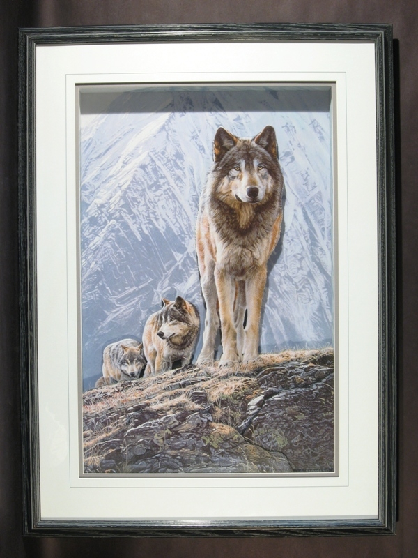 Wolf Pack Crossing the Ridge